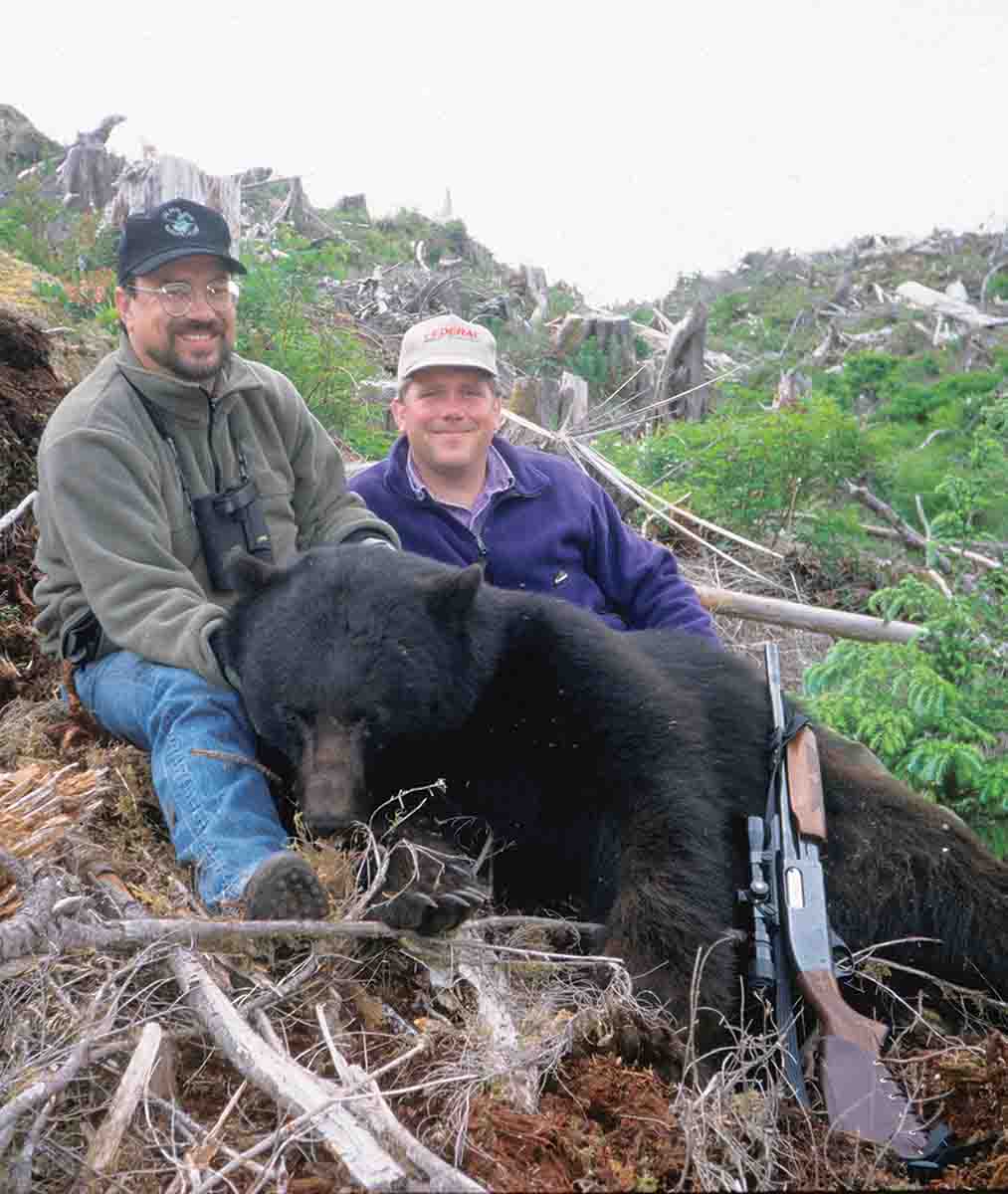 Few hunters refer to slug guns as big-bore rifles, but they are. John took this Vancouver Island black bear with a Federal slug from his old 870 Remington, with a bore diameter of over .70 caliber.
